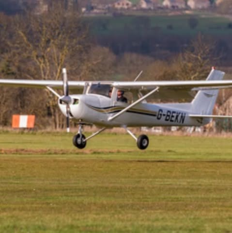G-BEKN Cessna taking off from Sibson grass runway