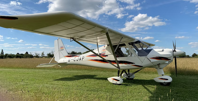 G-CJAP Ikarus C42 Microlight on the grass at Sibson Aerodrome